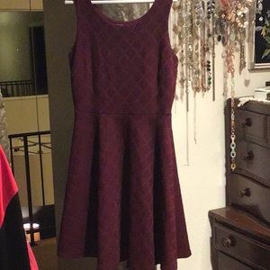 Dress.  Above the knee. Magenta, wine colored.  Lace fabric with black lining
